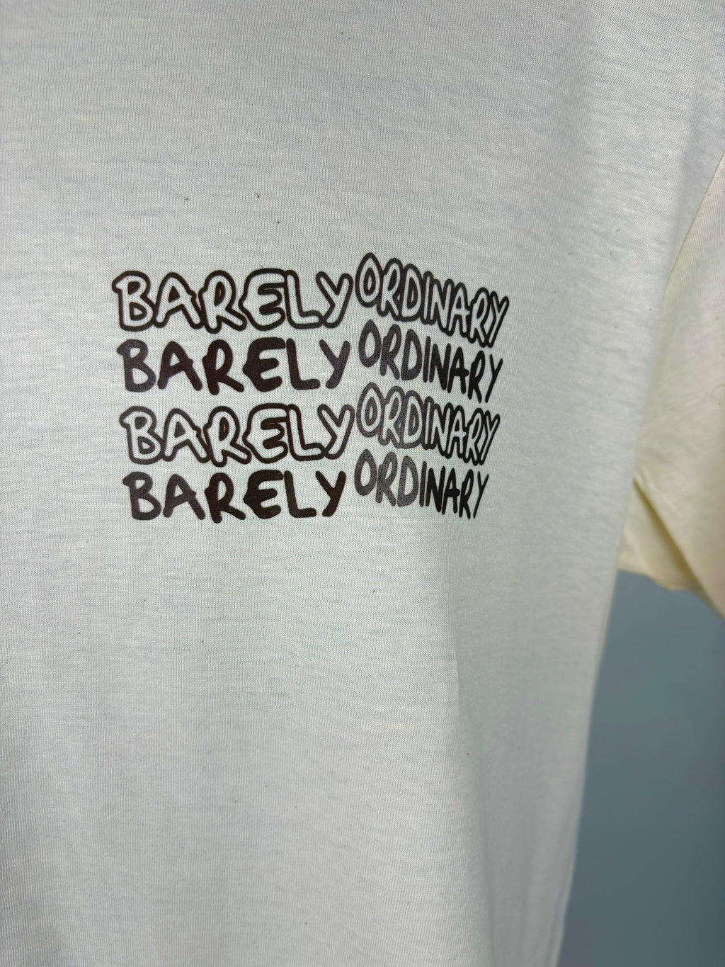 Barely "Repeat" Tee (Bone/Brwn)